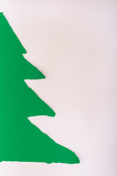 Green Torn Paper Christmas Tree on White Background