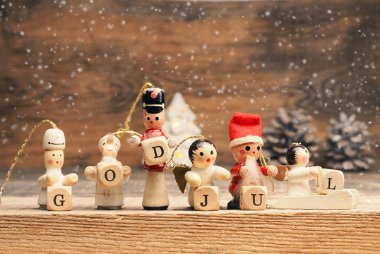 Small wooden block with the words God Jul and Christmas decoration