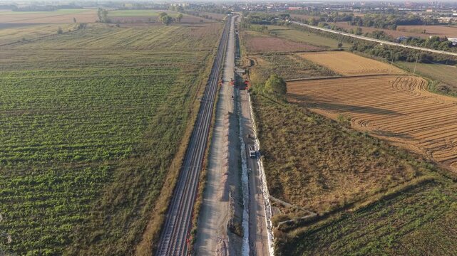 Aerial view of a new railway construction project in Lombardy, between Milan and Pavia.