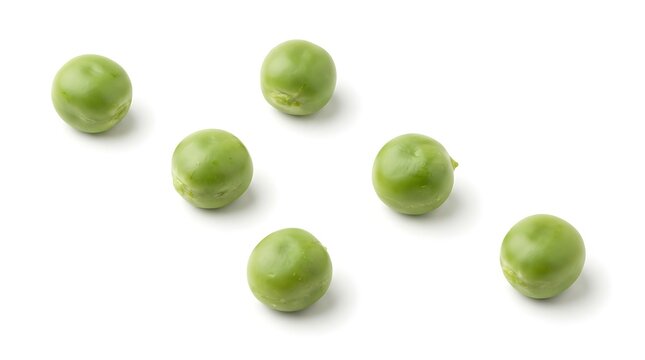 A group of six fresh green garden peas arranged on a white background, highlighting the round shape, smooth texture, and vibrant color of these healthy raw vegetables for culinary use