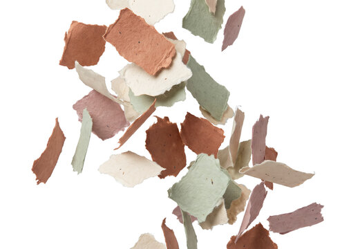 Irregular handmade paper confetti featuring tactile torn edges and earthy colors, ideal for craft projects, invitations, eco-conscious branding and editorial design.