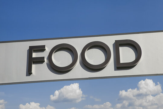 Large 3D letters spelling "Food" on a gray panel