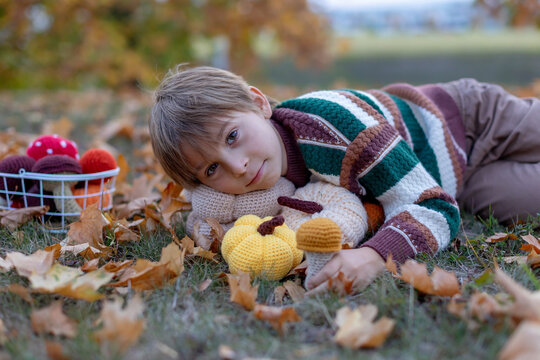 Cute child in the park autumn time