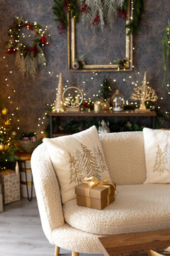 Beautifully decorated room for Chrismas in a cozy home with a couch, christmas tree and presents