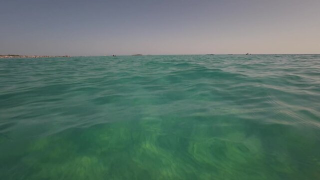 POV breaststroke swimming in Mediterranean sea, Italy