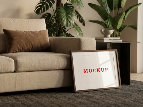 Horizontal poster frame mockup in a modern living room.