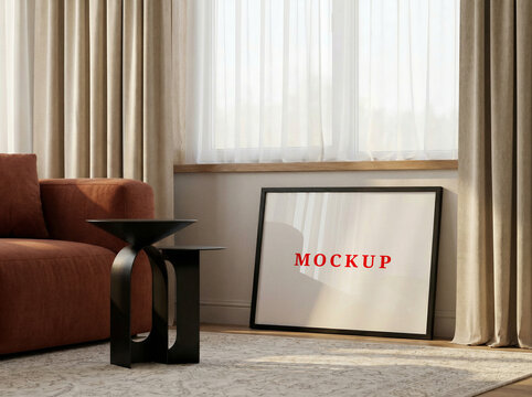 Horizontal poster frame mockup in a modern living room.