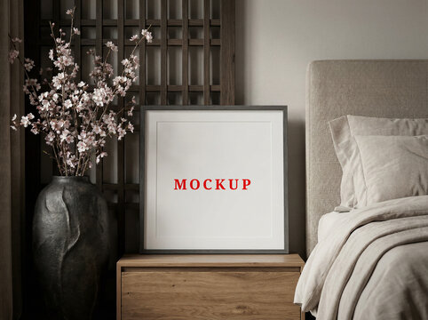 Minimalist living room interior mockup with a square poster frame.