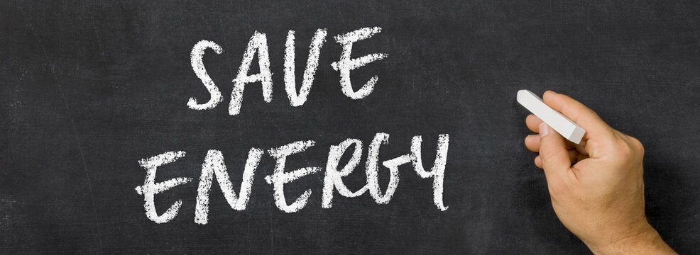 Text written on a blackboard - Save Energy