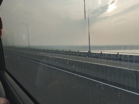 driving on the highway with big bridge.