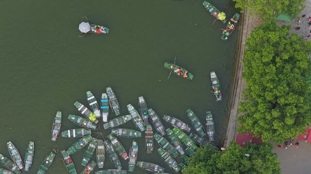 Aerial top view of tourist boats on tam coc river in vietnam