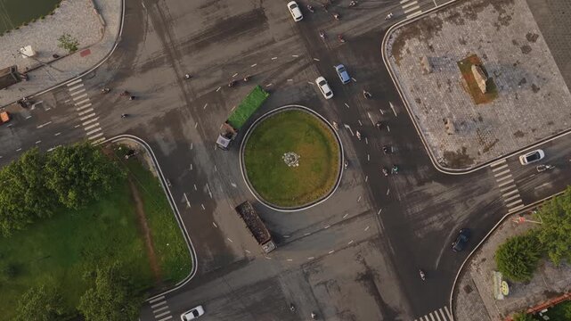 Aerial top down view of busy traffic roundabout in hoa lu vietnam