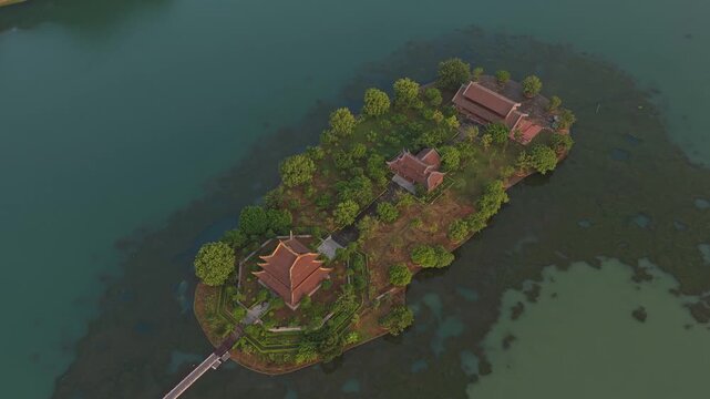 Golden pagoda island aerial view at sunrise in hoa lu, vietnam