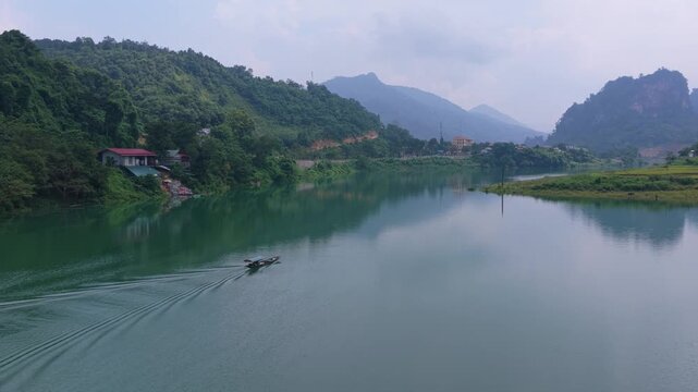 Traditional boat sailing on river in bac mei, vietnam