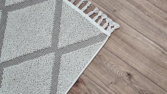 Natural wood laminate parquet floor. Room with floating laminate in new apartmen. Cozy home interior, modern design