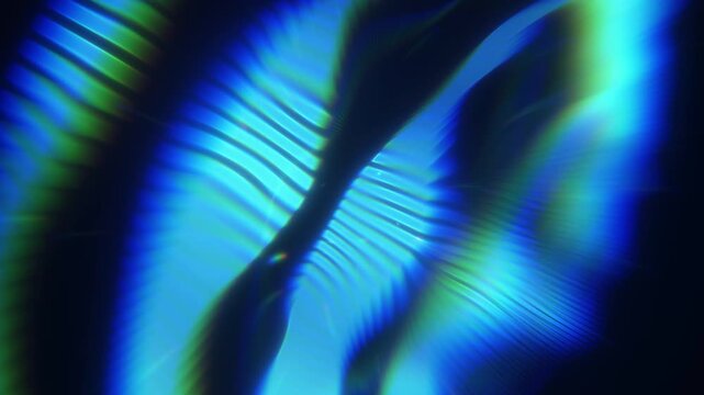 Abstract blue and green light refraction background with glowing wave patterns and dynamic energy flow