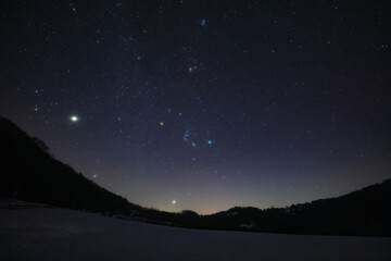 Orion constellation, zodiacal light and Milky Way stars on a dark countryside skies. © astrosystem
