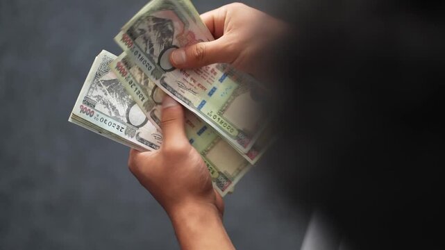 cash counting nepali thousand notes