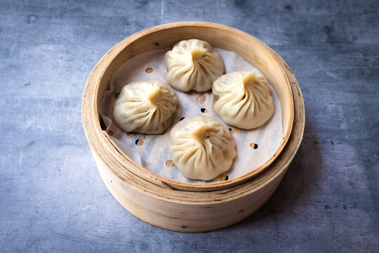 Steamed Chinese Dumplings in Bamboo Basket