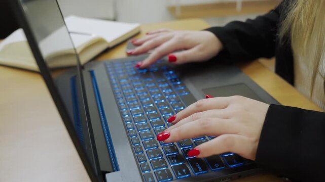 Programmer or IT typing, code cybersecurity or website on laptop at home office for concept verifying code algorithm. Employees woman write code on computer for software development. Remote work.
