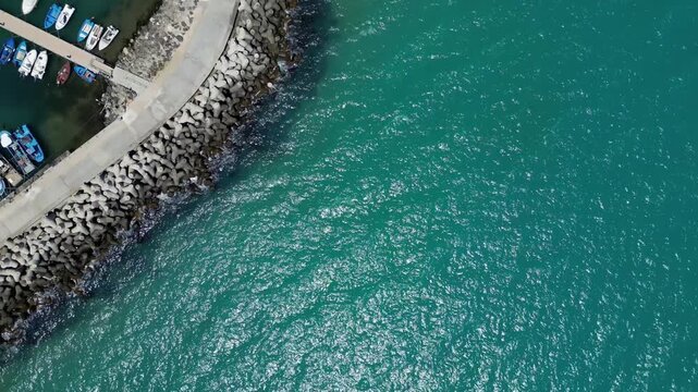 Aerial View of Marina Harbor with Boats and Yachts in Turquoise Sea Water