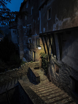 Albarrac&iacute;n medieval village illuminated at night by lantern light