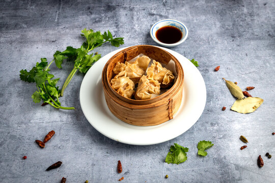 Steamed Chinese Dumplings in Bamboo Basket