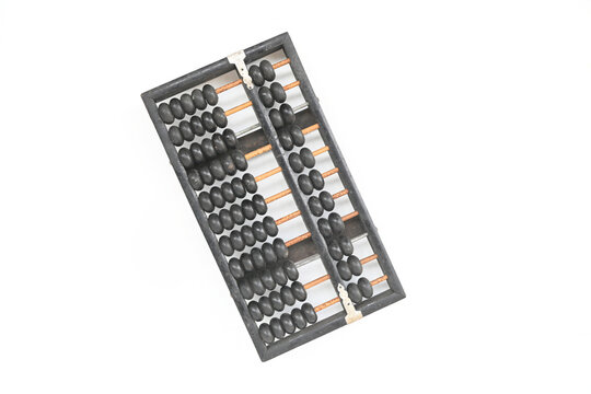 An old wooden abacus used for calculations on a white background