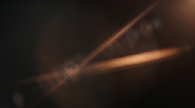 Copper Lens Flare with Diagonal Cinematic Light Streaks