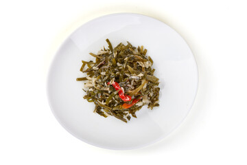 Fresh seaweed salad on a white plate © GSDesign