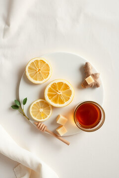Healthy immune boosting concept with ginger lemon tea, honey and mint leaves for winter wellness remedies
