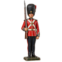Naklejka premium Toy soldier figurine in red uniform with tall black bearskin hat holding rifle, isolated on transparent background. Decorative ornament, holiday decor, collectible figure.