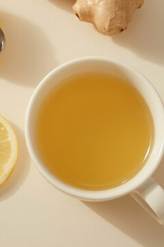Healthy immune boosting concept with ginger lemon tea, honey and mint leaves for winter wellness remedies
