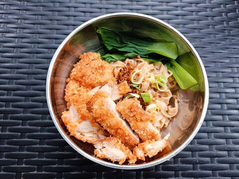 Top View of Crispy Fried Chicken Noodles with Vegetables