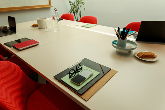 Meeting Room Setup With Red Chairs