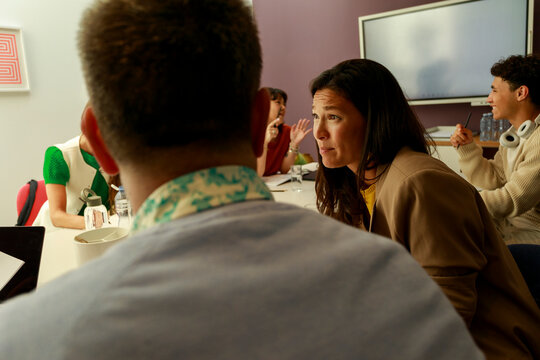 Group of People Discussing Ideas