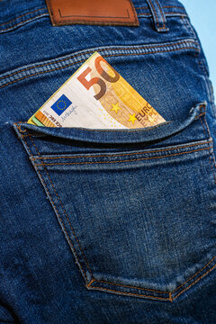 50 euro note visible in back pocket of blue denim jeans