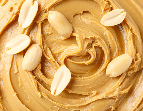 Peanut butter with peanuts background, full frame. AI