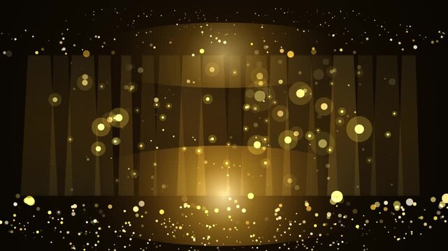 Abstract gold bokeh motion background with shimmering glitter particles and golden light rays falling on dark stage floor creating elegant luxury ambiance.
