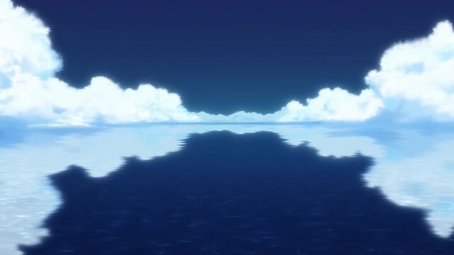White clouds reflected across a calm blue ocean beneath a clear sky