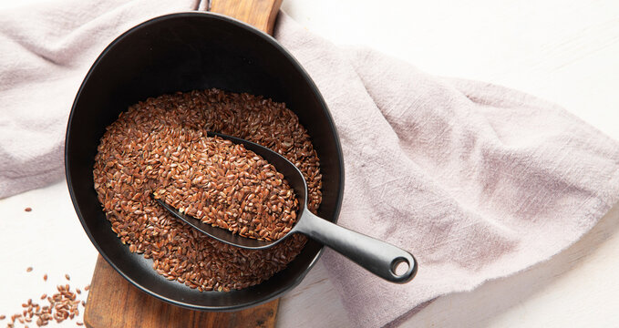 Healthy flax seed in bowl.