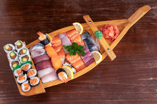 Fresh Assorted Sushi Platter on Wooden Boat