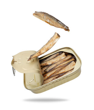 Open canned fish in oil in the air isolated on white background