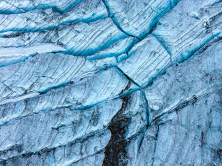 Aerial Close-Up Of Blue Glacier Ice And Crevasses With Texture In BC, Canada © edb3_16