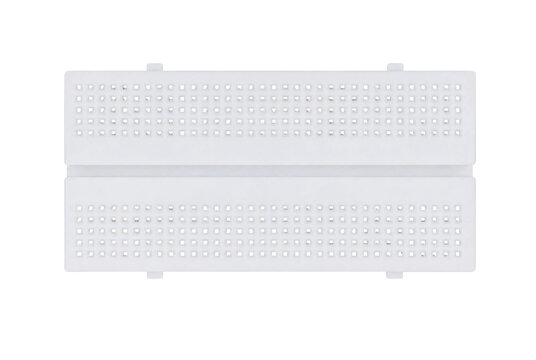 White plastic breadboard for electronic prototyping, featuring rows of small square holes, isolated on a clean white background