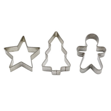 Three shiny metal cookie cutters, shaped like a star, a Christmas tree, and a gingerbread man, are neatly arranged on a clean white background