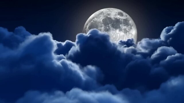 Bright full moon shines above thick clouds against a deep blue nighttime sky