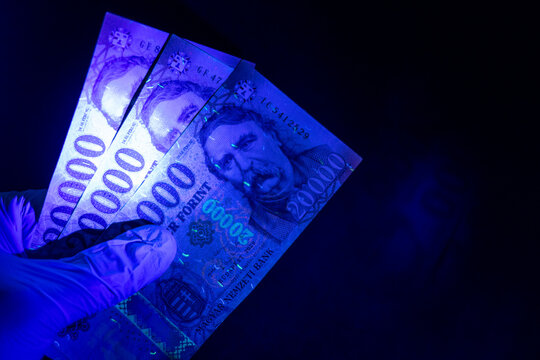 Hungarian Forint Banknotes Under UV Light