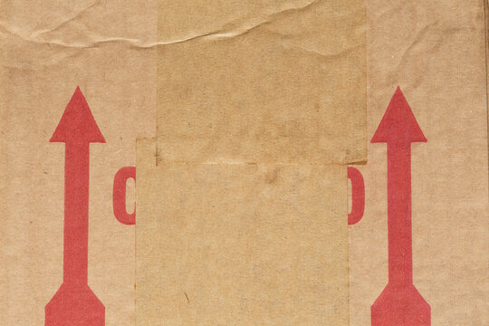 Grunge cardboard box texture with recycle sign
