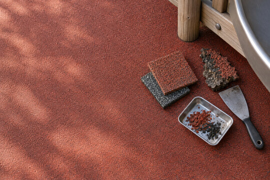 Playground Safety Surface Repair Tools with Rubber Flooring Samples and Maintenance Materials